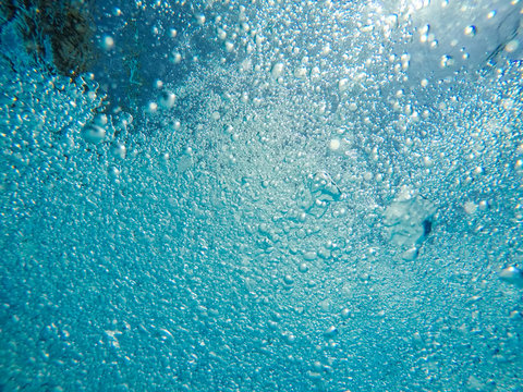 bubbles under water with a blue background