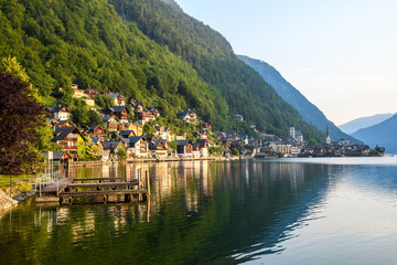 Fototapeta na wymiar Early morning in an ancient Austrian city on the shore of an Alpine lake among the mountains.