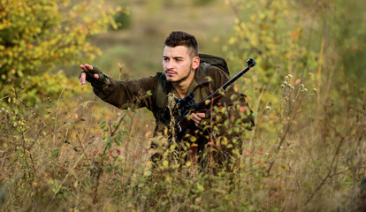 Hunter hold rifle. Hunting is brutal masculine hobby. Hunting and trapping seasons. Bearded serious...