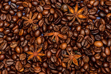 Fresh roasted coffee beans. Coffee for inspiration and energy charge. Beverage with caffeine and spices. Texture and background concept. Coffee shop or store. Degree of roasting coffee beans