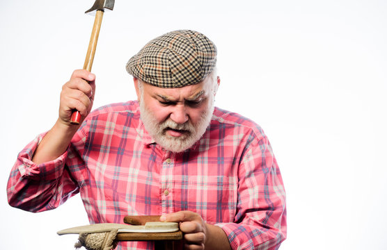 retro man repair shoes with hamCobbler workmanship. shoemaker at work. mature shoemaker in workshop make shoes. shoemaker working with solve and hammer at workshop. Fashion designer at work. - Powered by Adobe