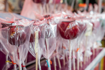 Apples coated with candy are sold at Japanese festivals.