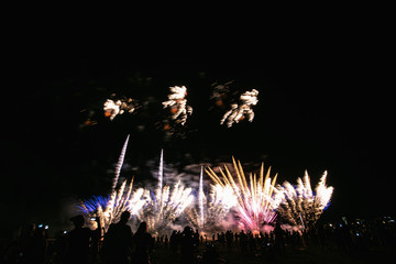 Real Fireworks on Deep Black Background Sky on Futuristic Fireworks festival show before...