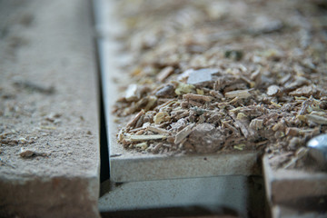Taking photographs of wood plywood, used for making pellets