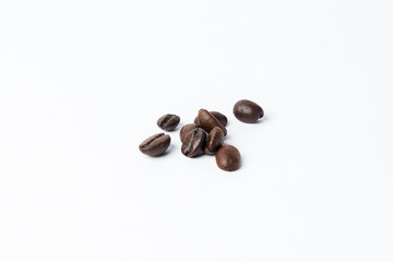 Naklejka premium coffee beans white background isolated