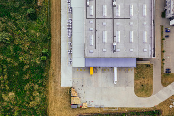 Aerial view of the distribution center, drone photography of the industrial logistic zone. 