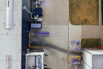 Aerial view of the distribution center, drone photography of the industrial logistic zone. 