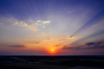 Aerial photography of the setting sun, flat lands of central Poland. 