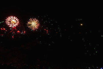 Real Fireworks  on Deep Black Background Sky on Futuristic Fireworks festival show before independence day on 4 of July