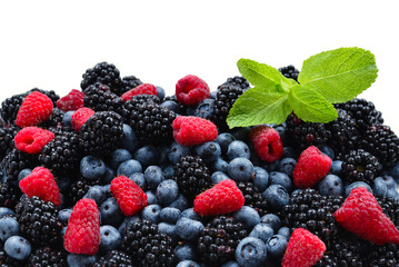 Blackberry, raspberry, blueberry and mint background.