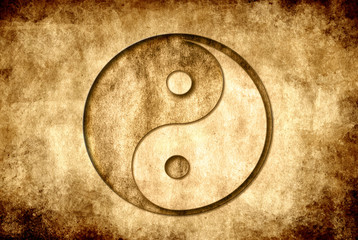 yin yang symbol over old grunge background 