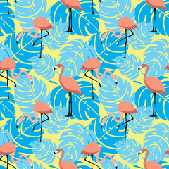 Flamingo and blue tropical leaves seamless pattern on yellow background