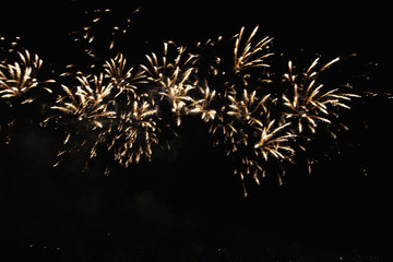 Real Fireworks footage 4k video on Deep Black Background Sky on Futuristic Fireworks festival show...