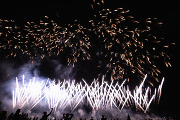 Real Fireworks footage 4k video on Deep Black Background Sky on Futuristic Fireworks festival show...