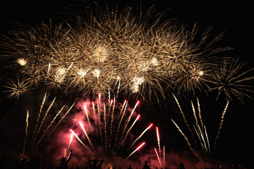 Real Fireworks footage 4k video on Deep Black Background Sky on Futuristic Fireworks festival show...