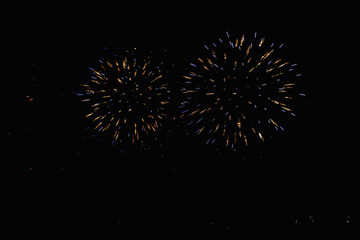 Real Fireworks footage 4k video on Deep Black Background Sky on Futuristic Fireworks festival show before independence day on 4 of July