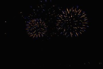 Real Fireworks footage 4k video on Deep Black Background Sky on Futuristic Fireworks festival show before independence day on 4 of July