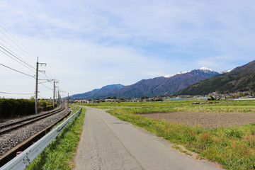 Fototapeta na wymiar 田園風景と木曽山脈（長野県伊那市）,ina,nagano,japan