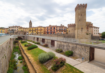 Obraz premium Umbertide (Italy) - A little charming medieval city with stone castle on Tiber river, province of Perugia. Here the historical center.