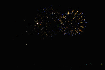 Real Fireworks footage 4k video on Deep Black Background Sky on Futuristic Fireworks festival show...