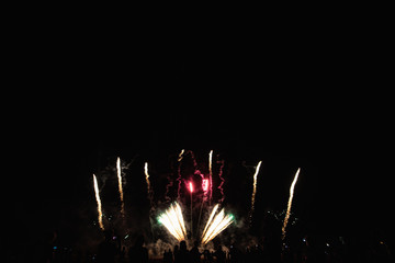 Real Fireworks footage 4k video on Deep Black Background Sky on Futuristic Fireworks festival show...