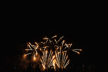 Real Fireworks footage 4k video on Deep Black Background Sky on Futuristic Fireworks festival show...