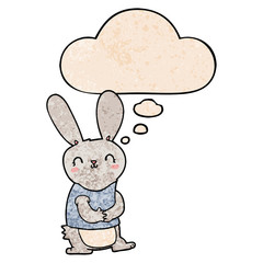 cute cartoon rabbit and thought bubble in grunge texture pattern style