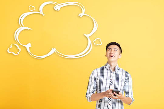  smiling young man with thinking bubble cloud concept