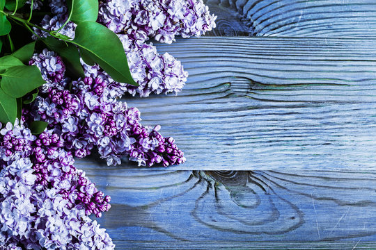 lilac flowers on vintage colored wood boads