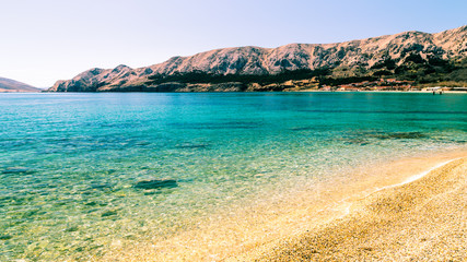 The bay of Baska in a sunny day