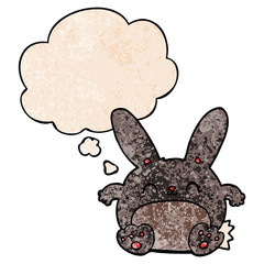 cartoon rabbit and thought bubble in grunge texture pattern style