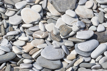 background made of a closeup of a pile of pebbles