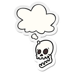 laughing skull cartoon and thought bubble as a printed sticker