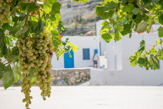 Street view of Potamos village with narrow alleys and traditional architecture in Antikythera island in Greece