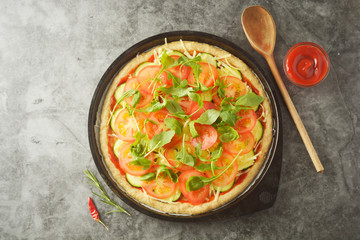 Vegetarian pizza. Cooking process of vegetable homemade pizza with fresh ingredients isolated on dark background. Copy space. Step by step photos.