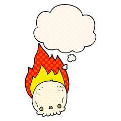 spooky cartoon flaming skull and thought bubble in comic book style