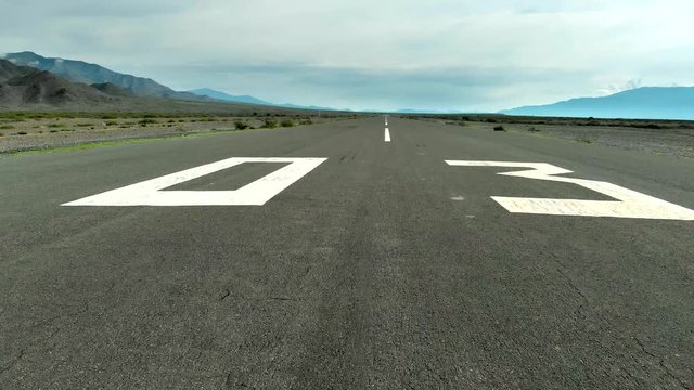 Plane is going takeoff runway, gradually accelerating and eventually taking off, flying in the air. View from pilot cabin. 4K