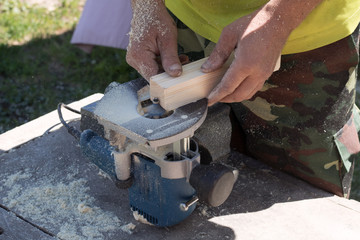 wood processing on a milling machine, handicraft wood processing using electric tools,