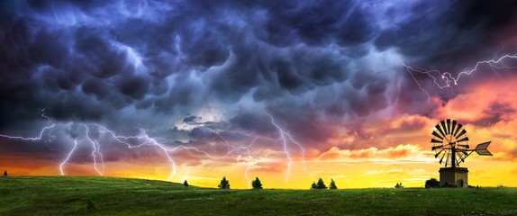 Thunderstorm And Lightning At Sunset In Country Field