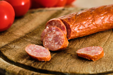 Sliced sausage and tomatoes