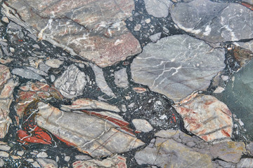 Abstract background pattern of multi-colored marble stone