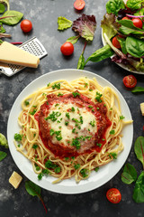 Chicken Parmesan with Cheese and Marinara Sauce served over spaghetti, pasta