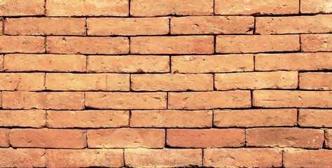 Obraz premium Antique brown brick wall of red color.texture grunge background.may use to interior design.