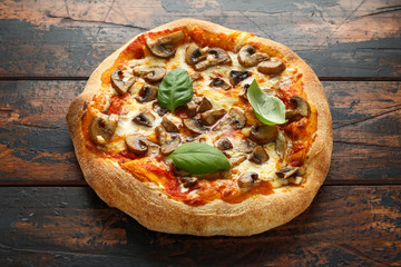 Hot Mushroom Pizza on wooden table. ready to eat. vegetarian food