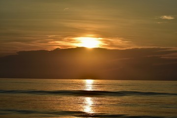Sunrise over ocean and clouds