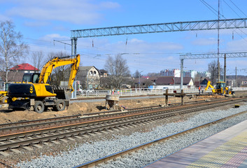 Fototapeta na wymiar excavator on railway construction