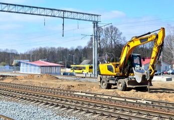 Fototapeta na wymiar excavator on railway construction
