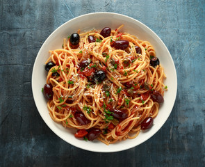 Pasta Alla Puttanesca with garlic, olives, capers, tomato and anchois fish