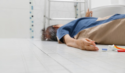 Elderly woman falling in bathroom because slippery surfaces