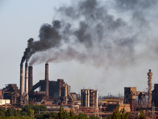 Air pollutants emissions. Toxic smoke of air pollutants, released into the atmosphere by chimney...